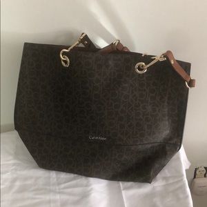Reversible Calvin Klein carry on purse